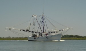 Shrimp boat on it's way to sea.